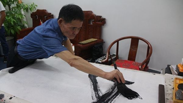 著名书法家周占能的艺术人生 著名书法家周占能的艺术人生