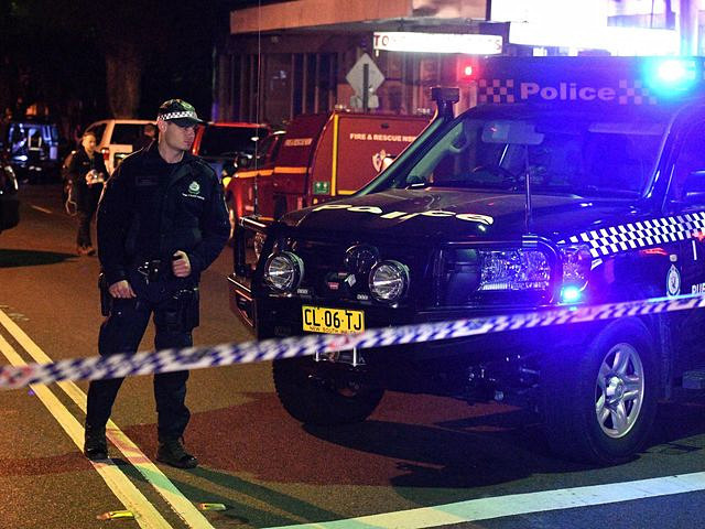 7月29日,澳大利亚悉尼市,警察封锁了相关区域.(新华/法新)