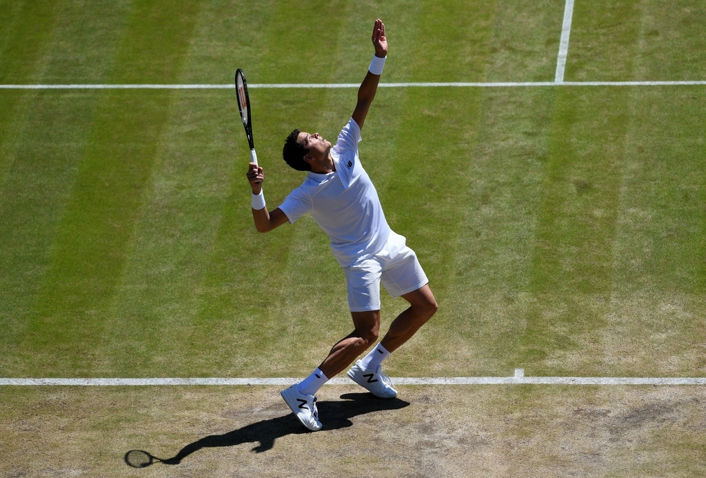 组图-拉奥尼奇胜德约杀手 时隔两年返温网4强