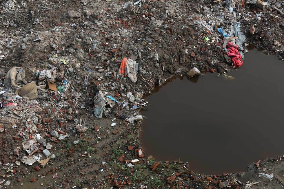 上海数千吨垃圾偷运江苏南通 数百米内臭味刺鼻