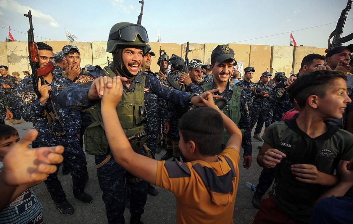 is军官暗示头目死亡 伊政府军庆祝作战胜利