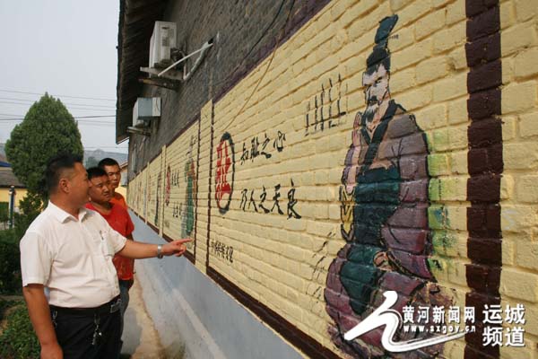 绛县:手工绘制文化墙 传播文明新风尚