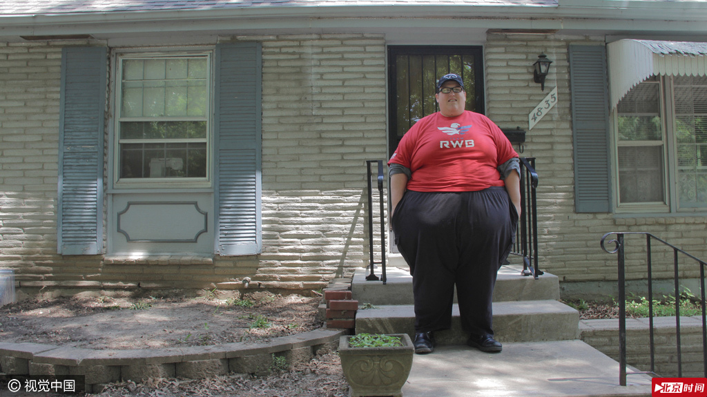 组图-500斤男子坚持长跑减肥 欲挑战马拉松