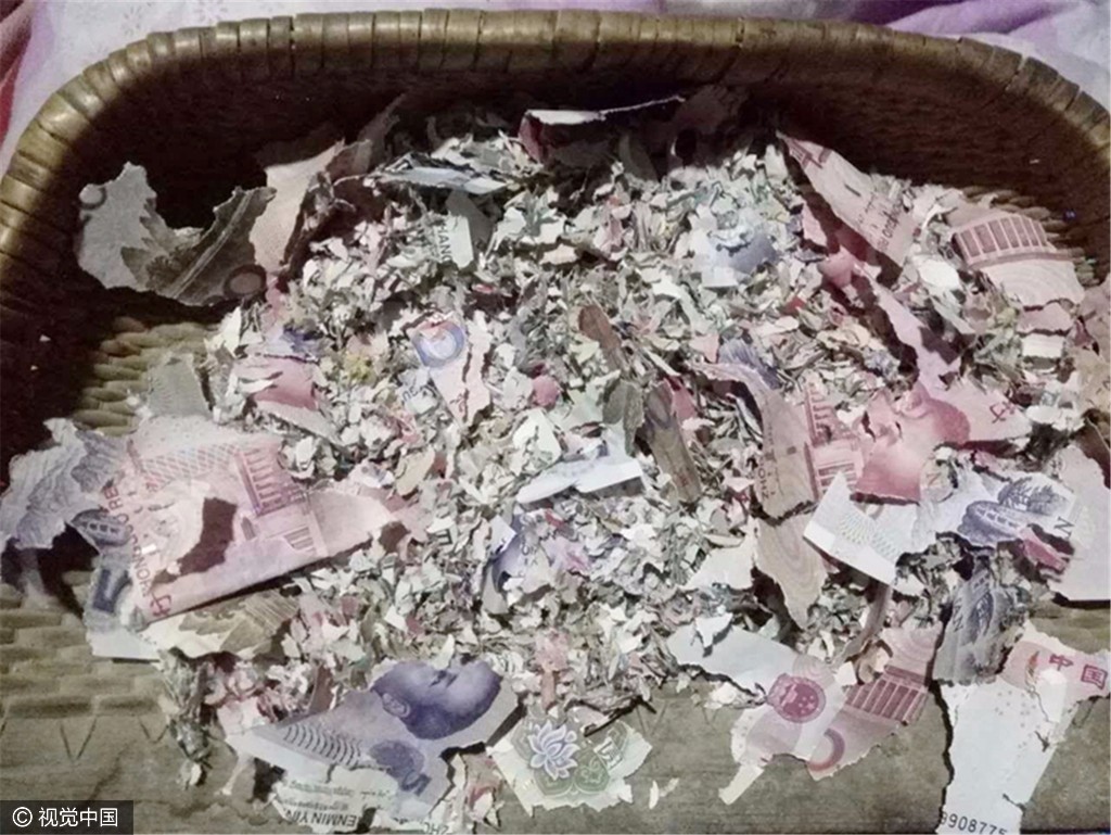 丈夫打工赚来2.7万农妇藏粮缸 被老鼠咬成碎片 丈夫打工赚来2.7万农妇藏粮缸 被老鼠咬成碎片