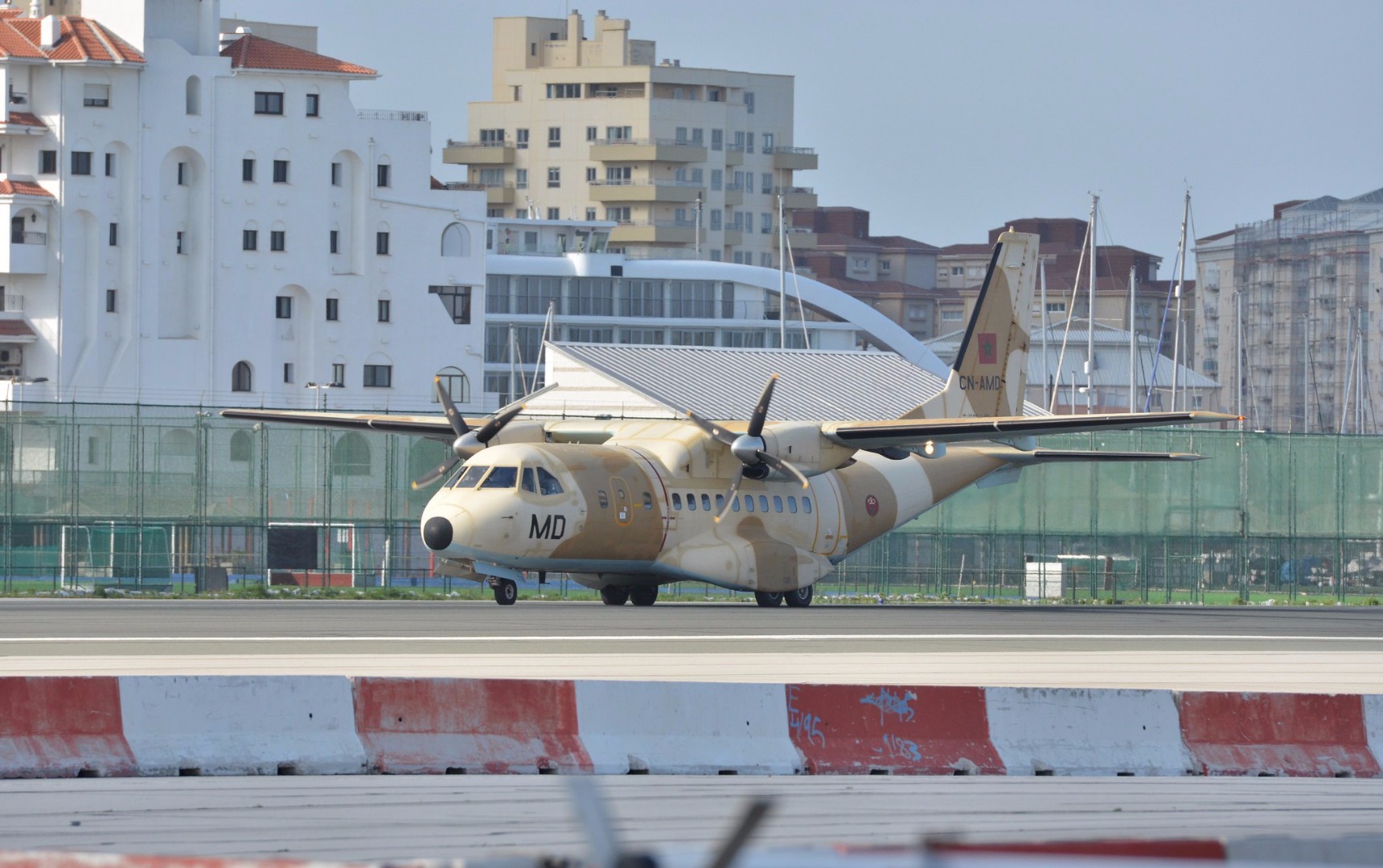 CN-235运输机：CN-235是西班牙航空制造公司和国营印度尼西亚飞机工业有限公司联合研制的双发涡轮螺旋桨支线运输机，是西班牙航空制造公司70年代初研制的C-212小型运输机的发展型。