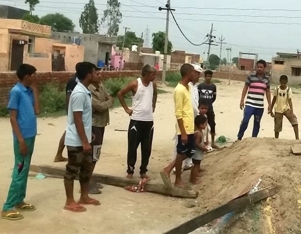 少年为赚表演费 被埋墓穴24小时身亡