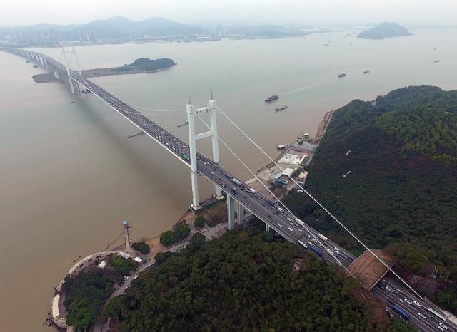 中国建虎门大桥跟广深高速收费赚钱:却捐1亿美