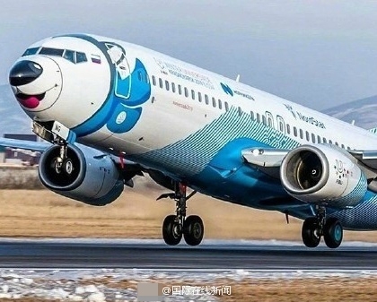 萌犬上天?俄罗斯一航空公司将飞机涂成哈士奇图案[图]