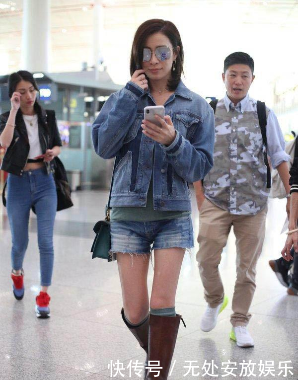 佘诗曼长筒袜配长筒靴,娘娘的腿,美出新概念