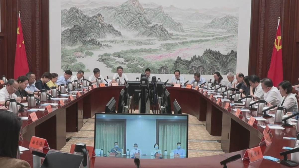 市委统战部向党外人士通报市委全会精神_北京时间