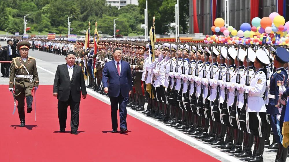 习近平出席金正恩举行的欢迎仪式 习近平出席金正恩举行的欢迎仪式